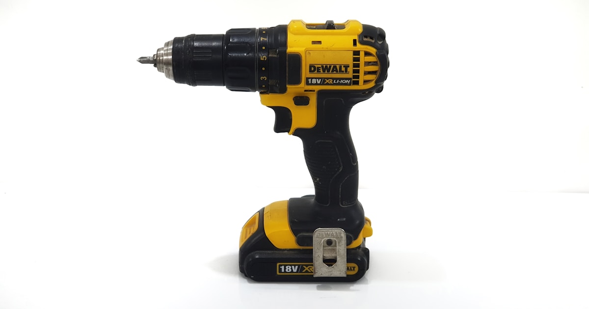 Cordless and corded jigsaws on a workshop workbench